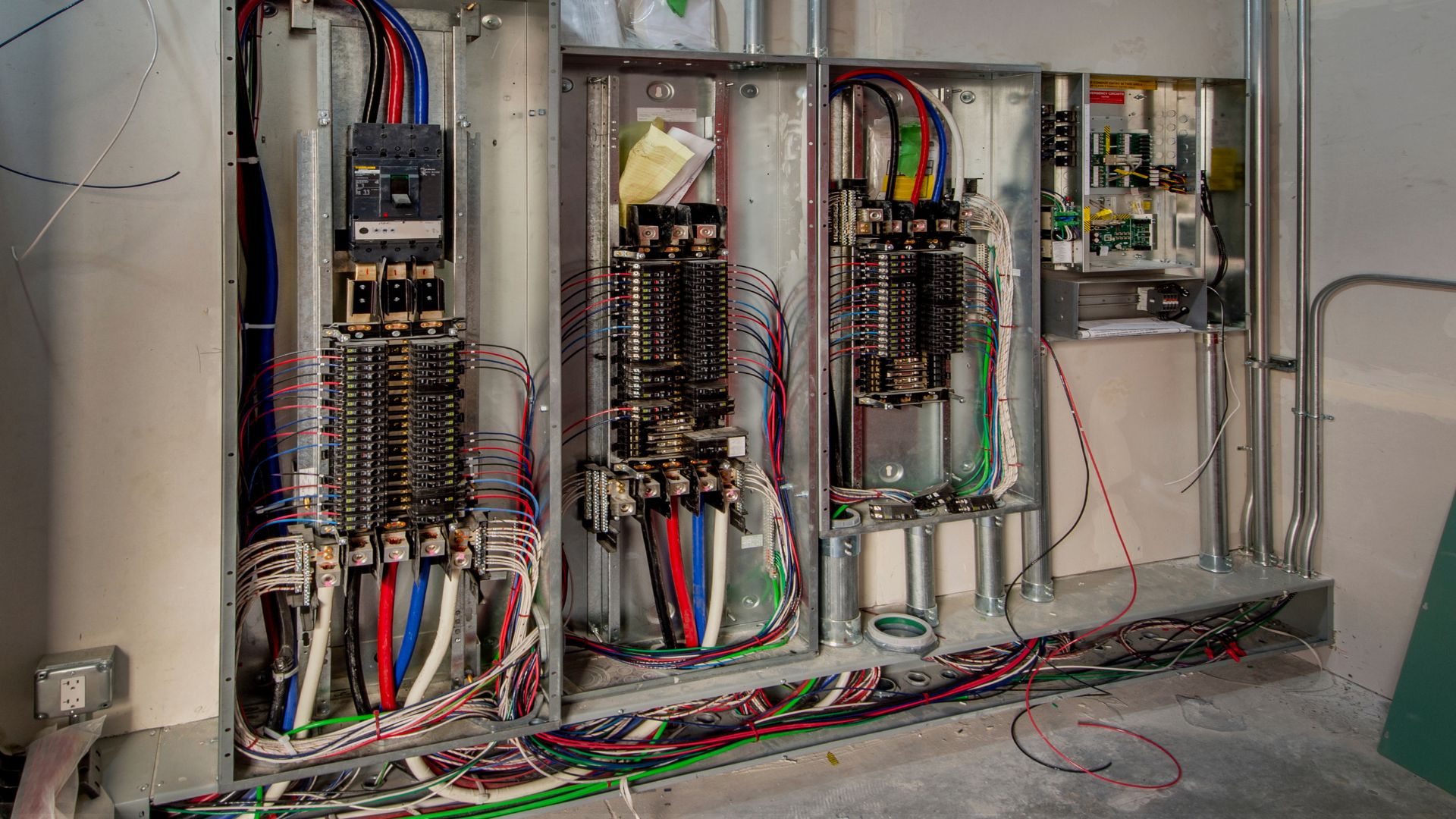 A clean and organized electrical panel installed by Neotecture.